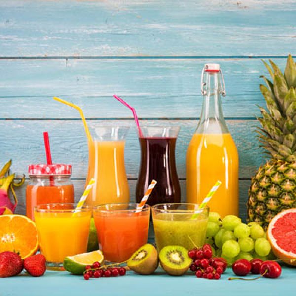 Various freshly squeezed fruits juices